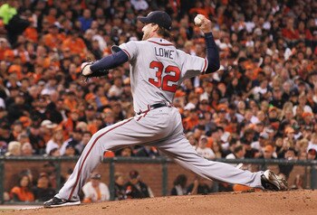 SAN FRANCISCO - OCTOBER 07:  Derek Lowe #32 of the Atlanta Braves pitches against San Francisco Giants during the first inning of game one of the NLDS at AT&T Park on October 7, 2010 in San Francisco, California.  (Photo by Justin Sullivan/Getty Images)