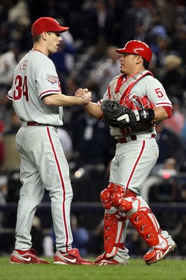 NEW YORK - OCTOBER 28:  (L-R) Cliff Lee #34 and Carlos Ruiz #51 of the Philadelphia Phillies celebrate after their 6-1 win against the New York Yankees in Game One of the 2009 MLB World Series at Yankee Stadium on October 28, 2009 in the Bronx borough of
