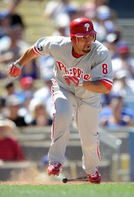 LOS ANGELES, CA - SEPTEMBER 01:  Shane Victorino #8 of the Philadelphia Phillies runs to first base against the Los Angeles Dodgers at Dodger Stadium on September 1, 2010 in Los Angeles, California.  (Photo by Harry How/Getty Images)