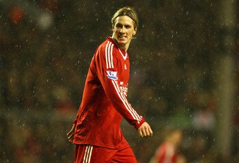 LIVERPOOL, ENGLAND - DECEMBER 26:   Fernando Torres of Liverpool looks on during the Barclays Premier League match between Liverpool and Wolverhampton Wanderers at Anfield on December 26, 2009 in Liverpool, England. (Photo by Clive Brunskill/Getty Images)