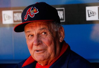 ATLANTA - OCTOBER 10:  Manager Bobby Cox #6 of the Atlanta Braves sits in the dugout during batting practice before facing the San Francisco Giants during Game Three of the NLDS of the 2010 MLB Playoffs at Turner Field on October 10, 2010 in Atlanta, Geor