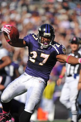 BALTIMORE, MD - OCTOBER 10:  Ray Rice #27 of the Baltimore Ravens celebrates his second touchdown against the Denver Broncos at M&T Bank Stadium on October 10, 2010 in Baltimore, Maryland. Players wore pink in recognition of Breast Cancer Awareness Month.