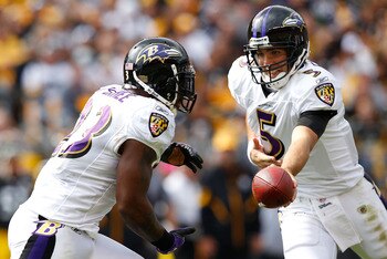 PITTSBURGH - OCTOBER 03:  Joe Flacco #5 of the Baltimore Ravens hands the ball off to teammate Willis McGahee #23 during the game against the Pittsburgh Steelers on October 3, 2010 at Heinz Field in Pittsburgh, Pennsylvania.  (Photo by Jared Wickerham/Get