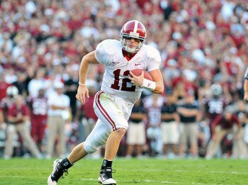 COLUMBIA, SC - OCTOBER 9: Quarterback Greg McElroy of the Alabama Crimson Tide runs upfield against the South Carolina Gamecocks October 9, 2010 at Williams-Brice Stadium in Columbia, South Carolina.  (Photo by Al Messerschmidt/Getty Images)