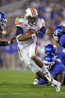 LEXINGTON, KY - OCTOBER 09:  Cam Newton #2 of the Auburn Tigers runs with the ball during the SEC game against the Kentucky Wildcats at Commonwealth Stadium on October 9, 2010 in Lexington, Kentucky.  (Photo by Andy Lyons/Getty Images)