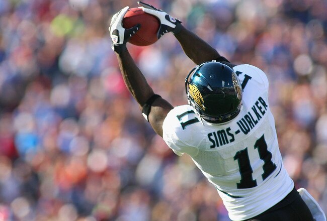 ORCHARD PARK, NY - OCTOBER 10:  Mike Sims-Walker #11 of the Jacksonville Jaguars makes a catch against the Buffalo Bills   at Ralph Wilson Stadium on October 10, 2010 in Orchard Park, New York. Jacksonville won 36-26. (Photo by Rick Stewart/Getty Images)