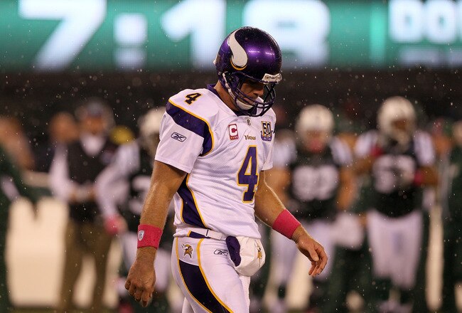 EAST RUTHERFORD, NJ - OCTOBER 11:  Quarterback Brett Favre #4 of the Minnesota Vikings walks back to the sideline against the New York Jets at New Meadowlands Stadium on October 11, 2010 in East Rutherford, New Jersey.  (Photo by Jim McIsaac/Getty Images)
