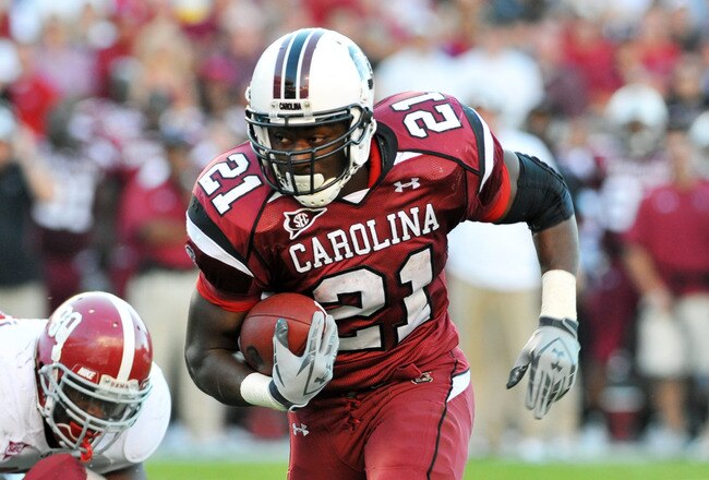 COLUMBIA, SC - OCTOBER 9: Running back Marcus Lattimore #21 of the South Carolina Gamecocks rushes upfield against the Alabama Crimson Tide October 9, 2010 at Williams-Brice Stadium in Columbia, South Carolina.  (Photo by Al Messerschmidt/Getty Images)