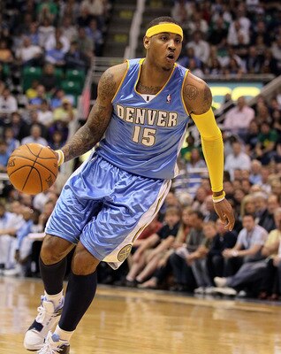 SALT LAKE CITY - APRIL 25:  Carmelo Anthony #15 of the Denver Nuggets dribbles the ball against the Utah Jazz during  Game Four of the Western Conference Quarterfinals of the 2010 NBA Playoffs at EnergySolutions Arena on April 25, 2010 in Salt Lake City,