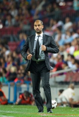 BARCELONA, SPAIN - SEPTEMBER 22:  Head coach Josep Guardiola of Barcelona looks on during the La Liga match between Barcelona and Sporting de Gijon at Nou Camp on September 22, 2010 in Barcelona, Spain. Barcelona won 1-0.  (Photo by Manuel Queimadelos Alo