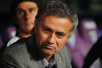 MALAGA, SPAIN - OCTOBER 16:  Real Madrid manager Jose Mourinho looks out from the subs bench before the La Liga match between Malaga and Real Madrid at La Rosaleda Stadium on October 16, 2010 in Malaga, Spain.  (Photo by Denis Doyle/Getty Images)