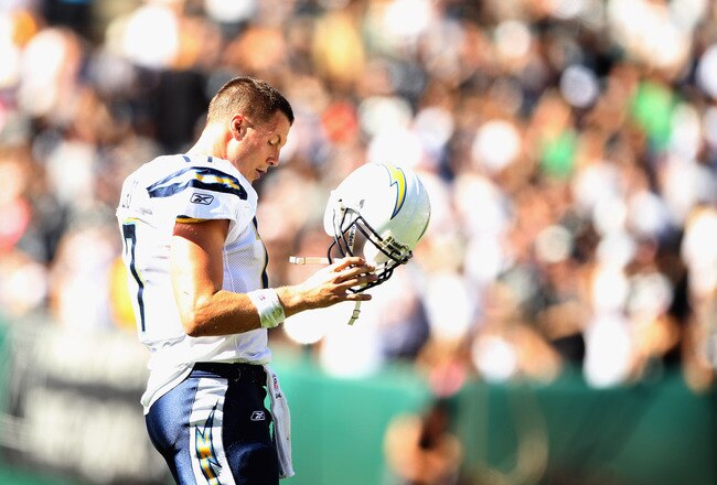 OAKLAND, CA - OCTOBER 10:  Philip Rivers #17 of the San Diego Chargers walks off the field after the Chargers fumbled the ball against the Oakland Raiders at Oakland-Alameda County Coliseum on October 10, 2010 in Oakland, California.  (Photo by Ezra Shaw/
