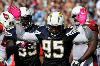 SAN DIEGO - OCTOBER 03:  Linebackers Shaun Phillips #95 and Kevin Burnett #99 of the San Diego Chargers celebrate a Phillips sack against the Arizona Cardinals at Qualcomm Stadium on October 3, 2010 in San Diego, California.   The Chargers won 41-10.  (Ph