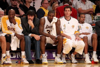 LOS ANGELES, CA - JUNE 06:  (L-R) Lamar Odom #7, Adam Morrison #6, Ron Artest #37, Luke Walton #4 and Shannon Brown #12 of the Los Angeles Lakers sit on the bench near the end of the Lakers' loss to the Boston Celtics in Game Two of the 2010 NBA Finals at