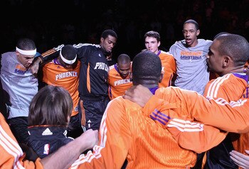 PHOENIX - OCTOBER 12:  The Phoenix Suns huddle up before the preseason NBA game against the Utah Jazz at US Airways Center on October 12, 2010 in Phoenix, Arizona. NOTE TO USER: User expressly acknowledges and agrees that, by downloading and or using this