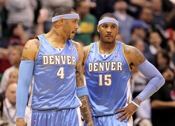 SALT LAKE CITY - APRIL 30:  Kenyon Martin #4 of the Denver Nuggets speaks to teammate Carmelo Anthony #15 during their loss to the Utah Jazz in Game Six of the Western Conference Quarterfinals of the 2010 NBA Playoffs at EnergySolutions Arena on April 30,