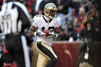 LANDOVER, MD - DECEMBER 6:  Marques Colston #12 of the New Orleans Saints scores the Saints first touchdown against the Washington Redskins at FedExField on December 6, 2009 in Landover, Maryland. (Photo by Larry French/Getty Images)