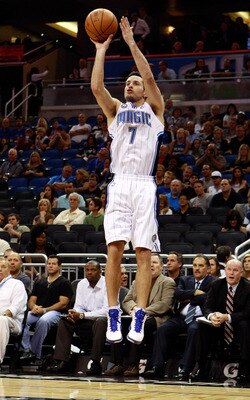 ORLANDO, FL - OCTOBER 10:  J.J. Redick #7 of the Orlando Magic attempts a shot during the game against the New Orleans Hornets at Amway Arena on October 10, 2010 in Orlando, Florida. NOTE TO USER: User expressly acknowledges and agrees that, by downloadin