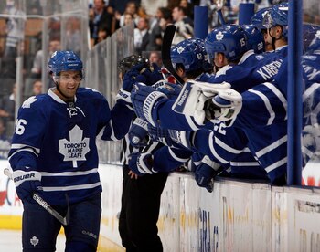TORONTO - OCTOBER 7: Clarke MacArthur #16 of the Toronto Maple Leafs celebrates his goal against the Montreal Canadiens during a regular season NHL game against the Toronto Maple Leafs at the Air Canada Centre October 7, 2010 in Toronto, Ontario, Canada.