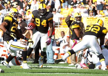 PITTSBURGH - OCTOBER 17:  Lawrence Timmons #94 of the Pittsburgh Steelers runs with the ball after catching an interception against the Cleveland Browns during the game on October 17, 2010 at Heinz Field in Pittsburgh, Pennsylvania.  (Photo by Jared Wicke