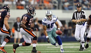 ARLINGTON, TX - SEPTEMBER 19:  Wide receiver Miles Austin #19 of the Dallas Cowboys runs past Lance Briggs #55 of the Chicago Bears at Cowboys Stadium on September 19, 2010 in Arlington, Texas.  (Photo by Ronald Martinez/Getty Images)