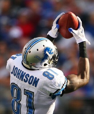 EAST RUTHERFORD, NJ - OCTOBER 17: Calvin Johnson #81 of the Detroit Lions catches the ball on an 87-yard touchdown run in the third quarter against the New York Giants at New Meadowlands Stadium on October 17, 2010 in East Rutherford, New Jersey. The Gian