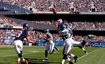 CHICAGO - OCTOBER 17: Walter Thurmond #38 of the Seattle Seahawks breaks up a pass intended for Devin Hester #23 of the Chicago Bears as Johnny Knox #13 attempts a catch at Soldier Field on October 17, 2010 in Chicago, Illinois. The Seahawks defeated the