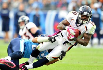 NASHVILLE, TN - OCTOBER 03:  Vincent Fuller #22 of the Tennessee Titans tackles Eddie Royal #19 of the Denver Broncos during the first half at LP Field on October 3, 2010 in Nashville, Tennessee.  (Photo by Grant Halverson/Getty Images)