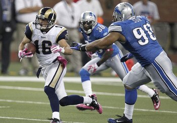 DETROIT - OCTOBER 10: Danny Amendola #16 of the St. Louis Rams tries to outrun the tackle of Ndamukong Suh #90 of the Detroit Lions on October 10, 2010 at Ford Field in Detroit, Michigan.  (Photo by Gregory Shamus/Getty Images)