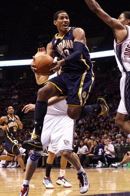 EAST RUTHERFORD, NJ - JANUARY 15:  Danny Granger #33 of the Indiana Pacers drives to the basket against the New Jersey Nets at the Izod Center on January 15, 2010 in East Rutherford, New Jersey. NOTE TO USER: User expressly acknowledges and agrees that, b