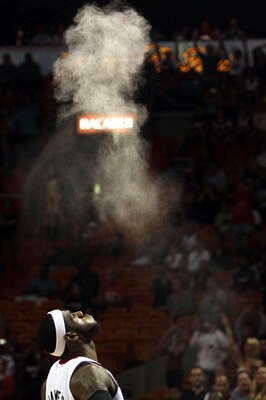 MIAMI - OCTOBER 18:  Forward LeBron James #6 of the Miami Heat prepares to face the Charlotte Bobcats on October 18, 2010 at American Airlines Arena in Miami, Florida. NOTE TO USER: User expressly acknowledges and agrees that, by downloading and/or using
