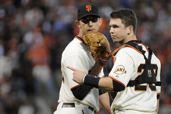 SAN FRANCISCO - OCTOBER 20:  Madison Bumgarner #40 of the San Francisco Giants talks with Buster Posey #28 in the fifth inning against the Philadelphia Phillies in Game Four of the NLCS during the 2010 MLB Playoffs at AT&T Park on October 20, 2010 in San