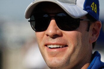 JOLIET, IL - JULY 09: Jimmy Johnson, driver of the #48 Lowe's Chevrolet, smiles after qualifying for the NASCAR Sprint Cup Series LIFELOCK.COM 400 at the Chicagoland Speedway on July 9, 2010 in Joliet, Illinois. (Photo by Jonathan Daniel/Getty Images)