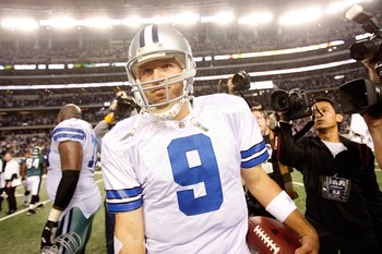 ARLINGTON, TX - JANUARY 09:  Quarterback Tony Romo #9 of the Dallas Cowboys during the 2010 NFC wild-card playoff game at Cowboys Stadium on January 9, 2010 in Arlington, Texas.  (Photo by Ronald Martinez/Getty Images)