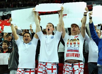 LONDON, ENGLAND - OCTOBER 12: England fans show their support during the UEFA EURO 2012 Group G Qualifying match between England and Montenegro at Wembley Stadium on October 12, 2010 in London, England.  (Photo by Mike Hewitt/Getty Images)