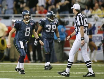 DETROIT - FEBRUARY 05:  Quarterback Matt Hasselbeck #8 of the Seattle Seahawks argues a call with referee Bill Leavy after throwing a pass out of bounds to receiver Darrell Jackson #82 in the second quarter against the Pittsburgh Steelers in Super Bowl XL