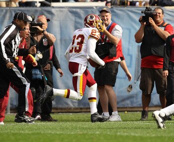 CHICAGO - OCTOBER 24: DeAngelo Hall #23 returns an interception 92 yards for a touchdown against the Chicago Bears at Soldier Field on October 24, 2010 in Chicago, Illinois. The Redskins defeated the Bears 17-14. (Photo by Jonathan Daniel/Getty Images)