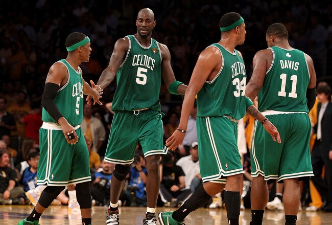 LOS ANGELES, CA - JUNE 17:  (L-R) Rajon Rondo #9, Kevin Garnett #5, Paul Pierce #34 and Glen Davis #11 of the Boston Celtics walk across the court in the second half against the Los Angeles Lakers in Game Seven of the 2010 NBA Finals at Staples Center on