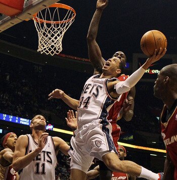 EAST RUTHERFORD, NJ - MARCH 03:  Devin Harris #34 of the New Jersey Nets drives to the hoop against the Cleveland Cavaliers at the Izod Center on March 3, 2010 in East Rutherford, New Jersey.NOTE TO USER: User expressly acknowledges and agrees that, by do