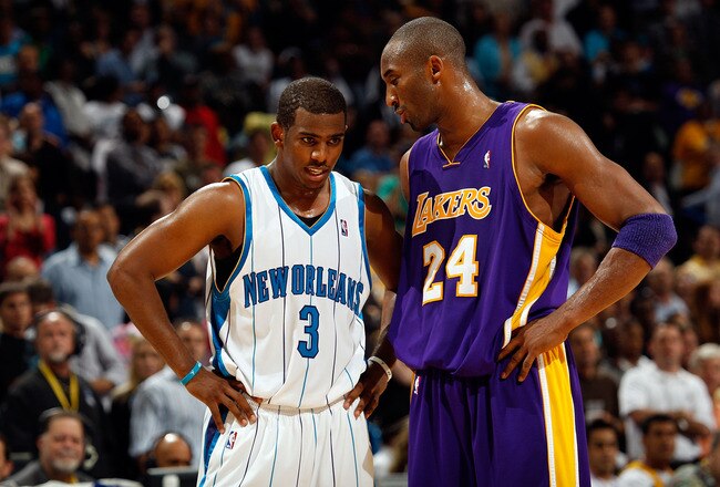 NEW ORLEANS - NOVEMBER 12:  Chris Paul #3 of the New Orleans Hornets talks with Kobe Bryant #24 of the Los Angeles Lakers  at the New Orleans Arena on November 12, 2008 in New Orleans, Louisiana. The Lakers defeated the Hornets 93-86.  NOTE TO USER: User 