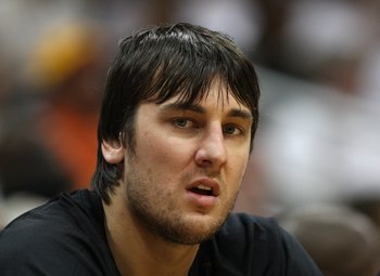 ATLANTA - MAY 2:  Center Andrew Bogut #6 of the Milwaukee Bucks sits on the bench with an injury during Game Seven of the Eastern Conference Quarterfinals between the Milwaukee Bucks and the Atlanta Hawks during the 2010 NBA Playoffs at Philips Arena on M
