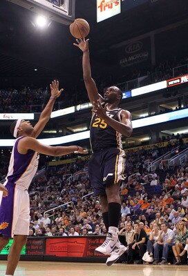 PHOENIX - OCTOBER 12:  Al Jefferson #25 of the Utah Jazz puts up a shot during the preseason NBA game against the Phoenix Suns at US Airways Center on October 12, 2010 in Phoenix, Arizona. NOTE TO USER: User expressly acknowledges and agrees that, by down