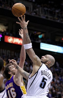 SALT LAKE CITY - MAY 10:  Carlos Boozer #5 of the Utah Jazz shoots over Pau Gasol #16 of the Los Angeles Lakers during Game Four of the Western Conference Semifinals of the 2010 NBA Playoffs on May 10, 2010 at Energy Solutions Arena in Salt Lake City, Uta