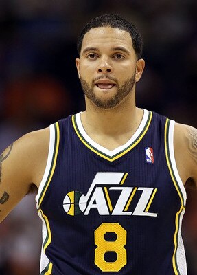 PHOENIX - OCTOBER 12:  Deron Williams #8 of the Utah Jazz in action during the preseason NBA game against the Phoenix Suns at US Airways Center on October 12, 2010 in Phoenix, Arizona. NOTE TO USER: User expressly acknowledges and agrees that, by download