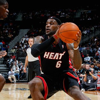 ATLANTA - OCTOBER 21:  LeBron James #6 of the Miami Heat drives against Marvin Williams #24 of the Atlanta Hawks at Philips Arena on October 21, 2010 in Atlanta, Georgia.  (Photo by Kevin C. Cox/Getty Images)