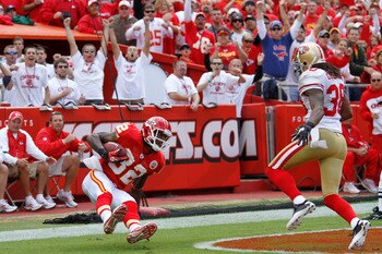 KANSAS CITY, MO - SEPTEMBER 26: Dwayne Bowe #82 of the Kansas City Chiefs makes a 45-yard touchdown reception behind Dashon Goldson #38 of the San Francisco 49ers at Arrowhead Stadium on September 26, 2010 in Kansas City, Missouri. The Chiefs won 31-10. (