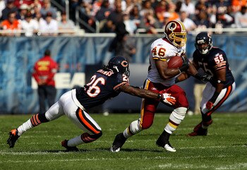 CHICAGO - OCTOBER 24: Ryan Torain #46 of the Washington Redskins runs past Tim Jennings #26 of the Chicago Bears at Soldier Field on October 24, 2010 in Chicago, Illinois. The Redskins defeated the Bears 17-14. (Photo by Jonathan Daniel/Getty Images)