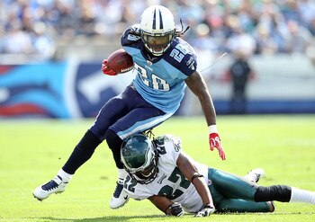 NASHVILLE, TN - OCTOBER 24:  Chris Johnson #28 of the Tennessee Titans runs with the while defended by Asante Samuel #22 of the Philadelphia Eagles at LP Field on October 24, 2010 in Nashville, Tennessee. The Titans won 37-19.  (Photo by Andy Lyons/Getty