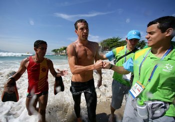 RIO DE JANEIRO, BRAZIL - JULY 14:  Fran Crippen of the United States of America exits the water after winning the gold medal in the Men's Swimming Marathon 10km Final, part of the 2007 XV Pan American Games on July 14, 2007 at Copacabana Beach in Rio De J