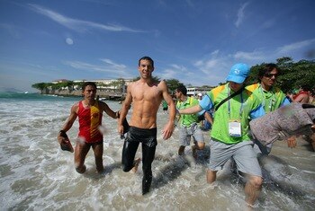 RIO DE JANEIRO, BRAZIL - JULY 14:  Fran Crippen of the USA exits the water after his victory during the Men's Swimming Marathon 10km Final, part of the XV Pan American Games on July 14, 2007 at Copacabana Beach in Rio De Janeiro, Brazil.  (Photo by Donald